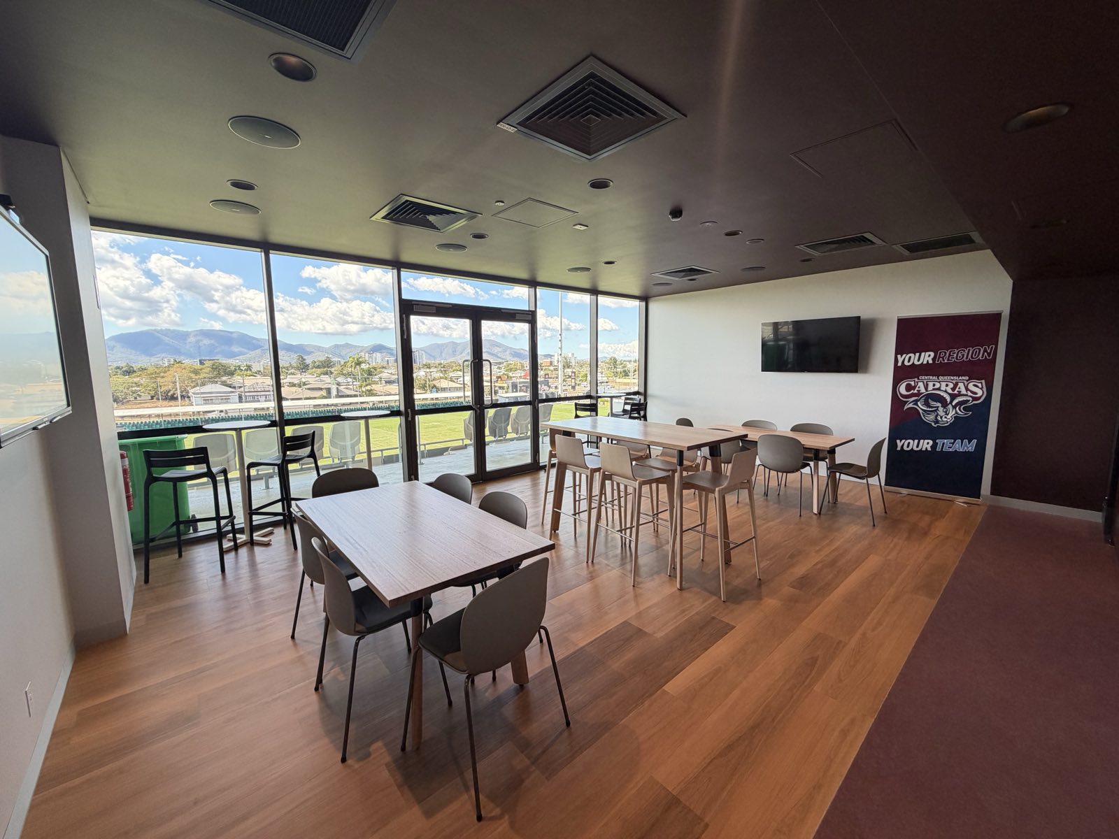 24 seater corporate box lounge with high tables